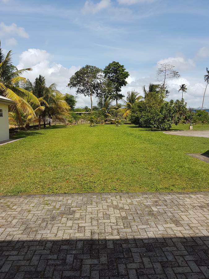 Piarco Village Suites Buitenkant foto